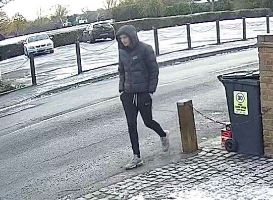 The CCTV footage shows this man making off with the presents left out for the refuse collectors