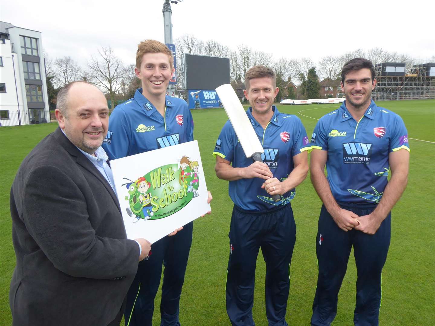Neil Peck, director of WW Martin, joins Kent cricketers Zak Crawley, Joe Denly and Grant Stewart to promote the walk to school campaign. (1500363)