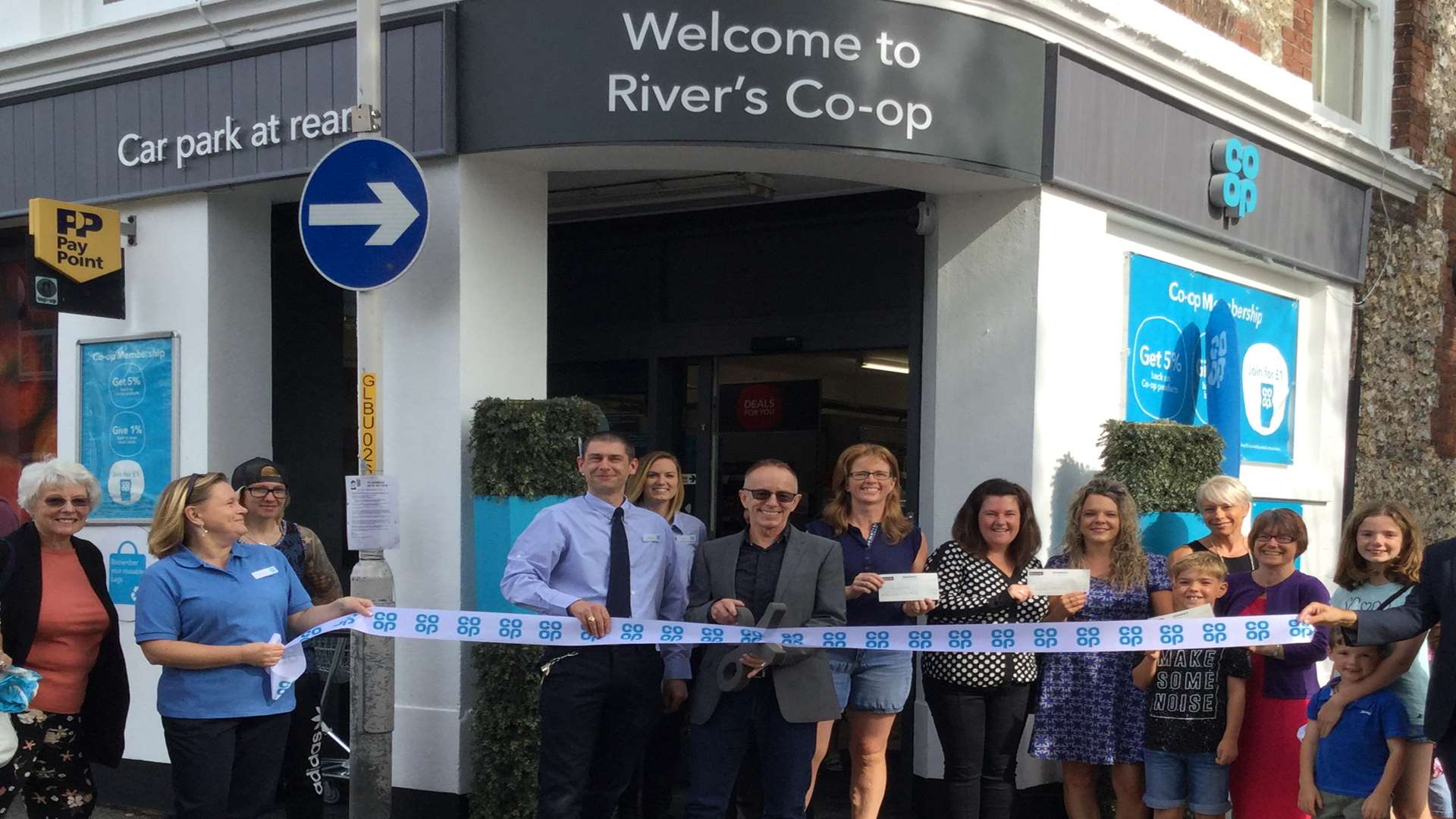 Topper Headon, with store manager Simon Taylor, opens the new-look Co-op in River. Picture: Co-operative Group