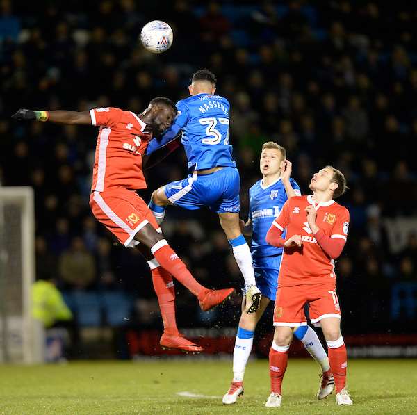 Gillingham's Navid Nasseri against MK Dons' Ousseynou Cisse Picture: Ady Kerry (1341582)
