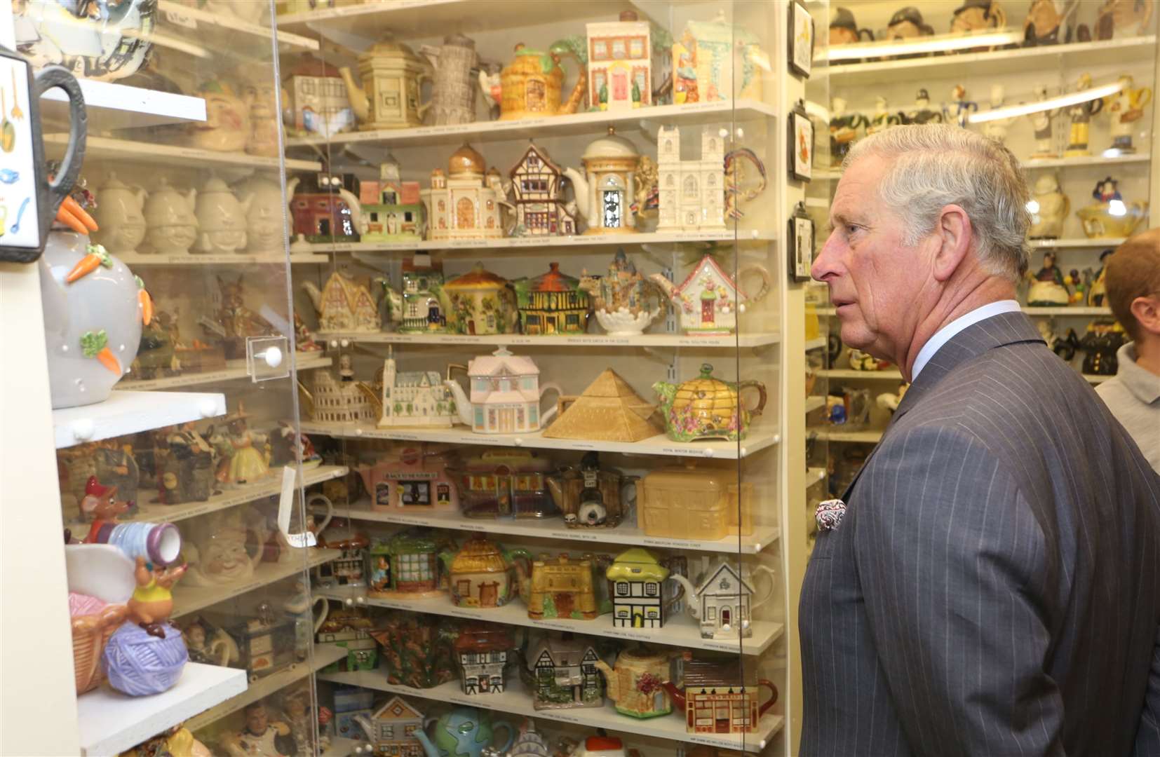 King Charles looks bemused at the Teapot Island collection back in 2014. Picture: Martin Apps