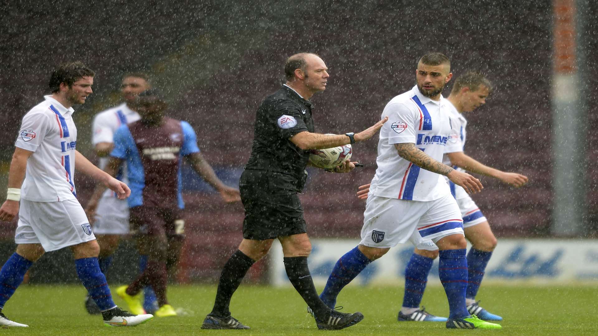 Referee Andy Haines takes the players off Picture: Barry Goodwin