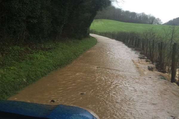 Reader Mark Packer sent in these photos of flooding near Swanton Lane in Hawkinge