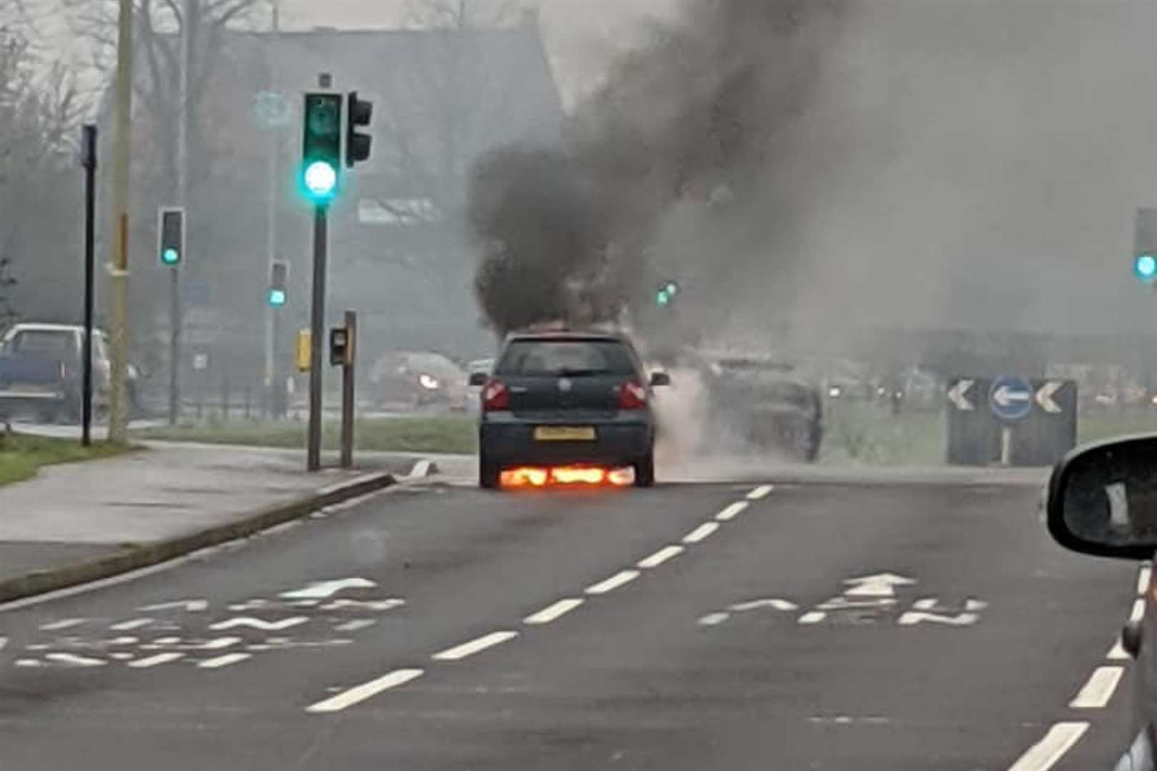 A car is on fire on Simone Weil Avenue. Photo: Kerry Ann (44194389)