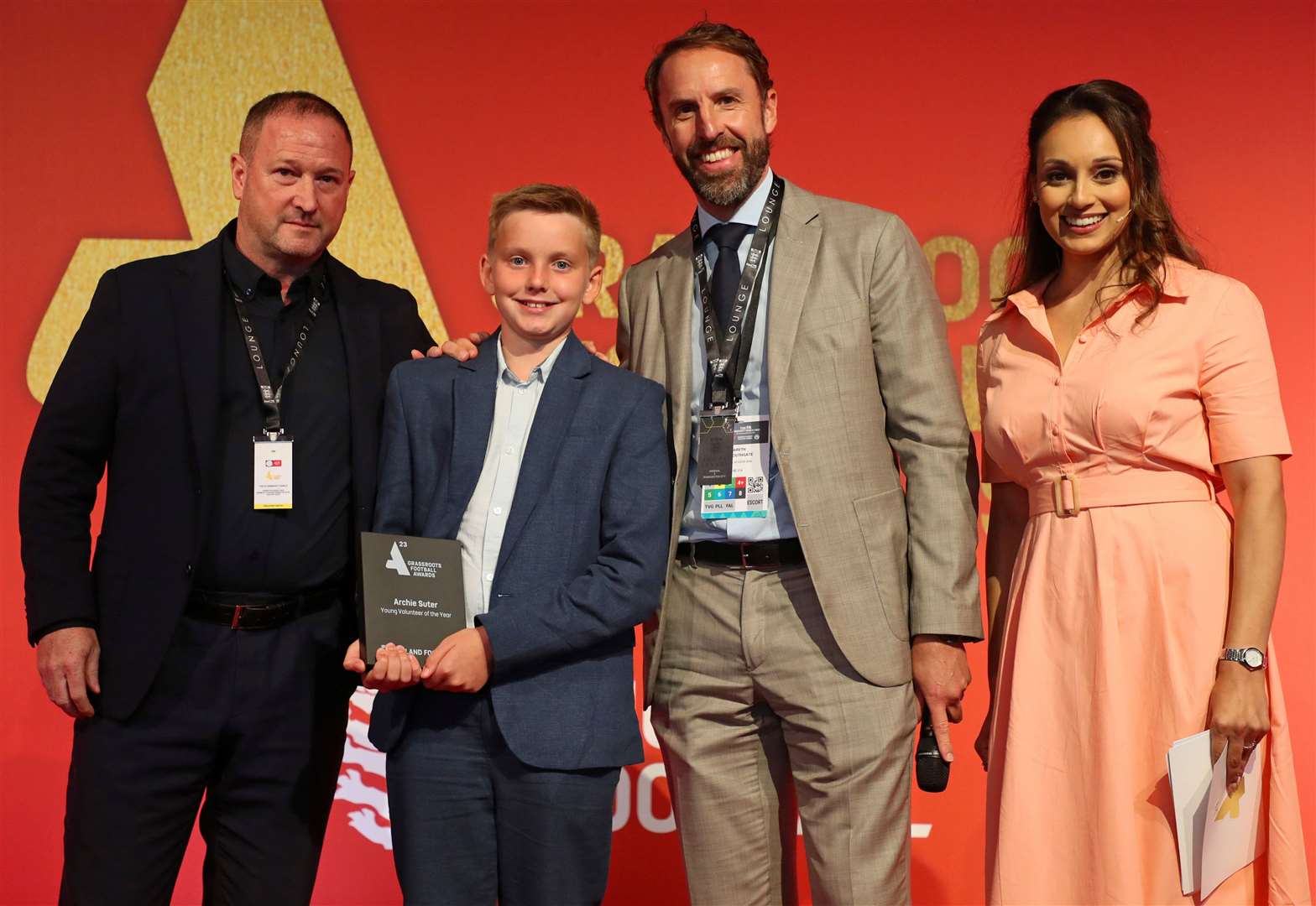 Faversham Strike Force's Archie Suter, winner of Young Volunteer of the Year, is presented with his award at Wembley by England boss Gareth Southgate. Picture: Henry Browne, The FA/Getty Images
