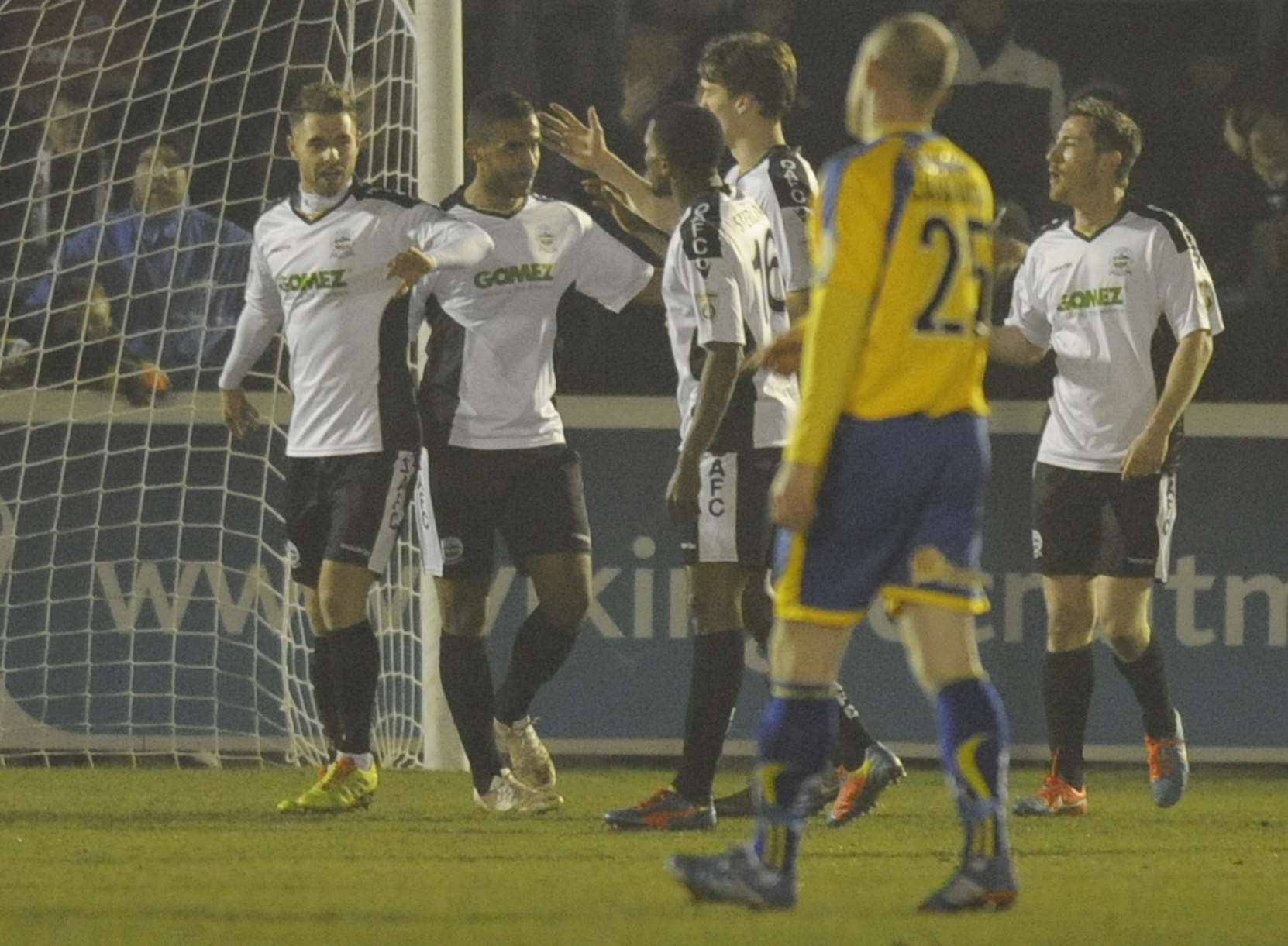 Nicky Deverdics, left, is congratulated by his team-mates after his first goal against Altrincham Picture: Tony Flashman