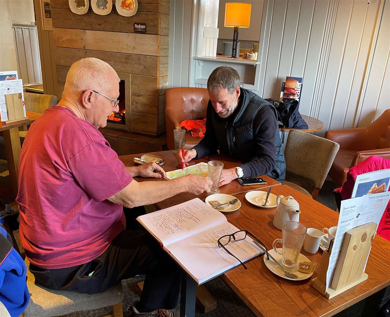 Duncan Edwards, right, who will be presenting the case for the village green campaigners, reviewing the evidence with resident Roger Smoothy
