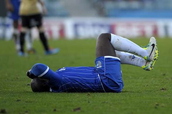 Game over for Adebayo Akinfenwa as he goes down after an hour Picture: Barry Goodwin
