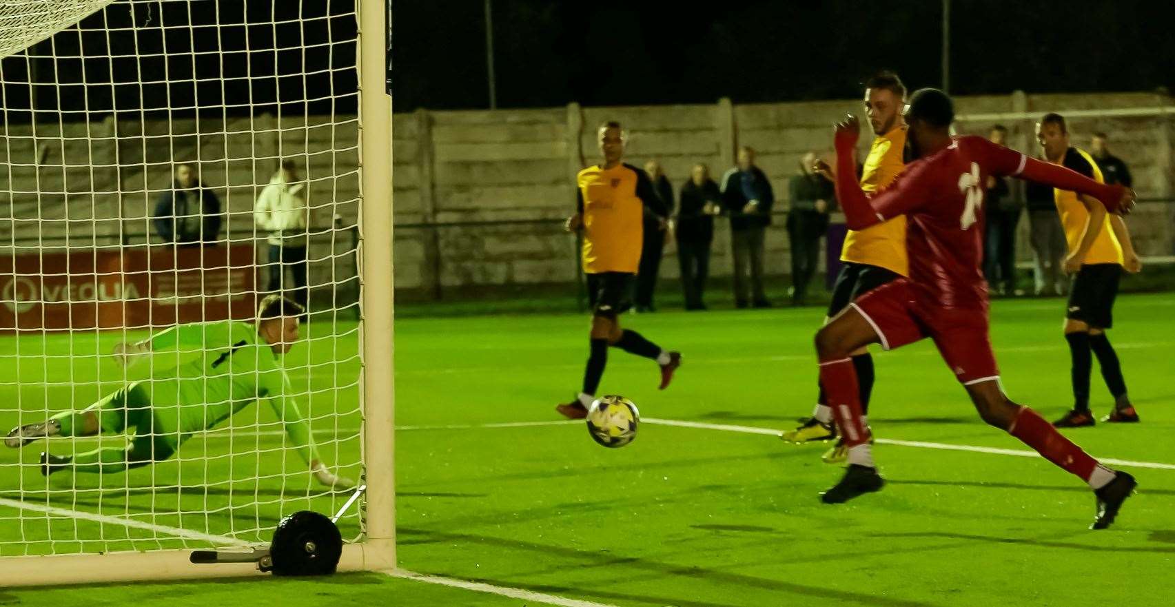 Whitstable’s Emmanuel Oloyede scores on his debut in their 4-2 victory away to Kennington on Tuesday night. Picture: Les Biggs