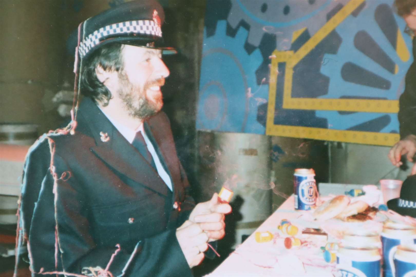 Director Nigel Pickard posing as a policeman during a Motormouth end-of-series wrap party at Maidstone