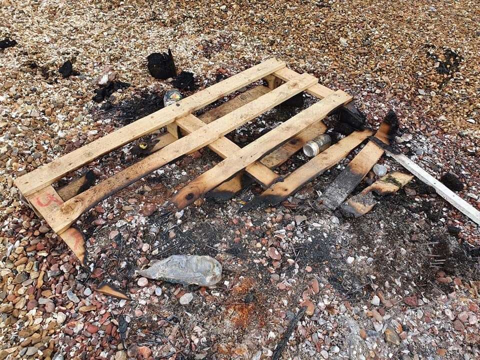 Burnt pallets left behind on Whitstable beach. Picture: Fef Griffin