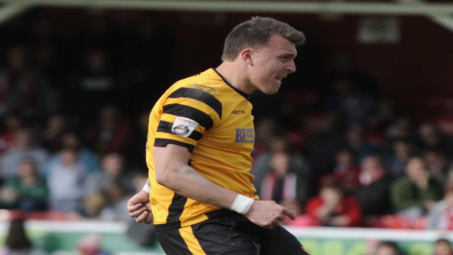 Maidstone forward Alex Flisher scores from the spot in play-off final shoot-out Picture: Gary Browne