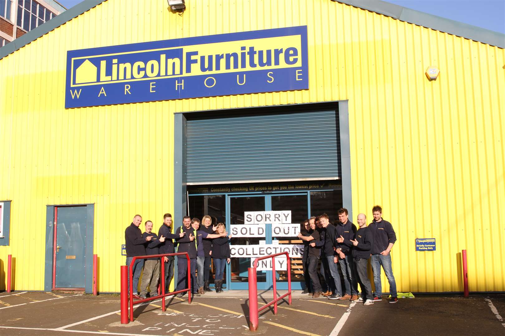 Lincoln Furniture Warehouse staff at the store as it closed after 16 years