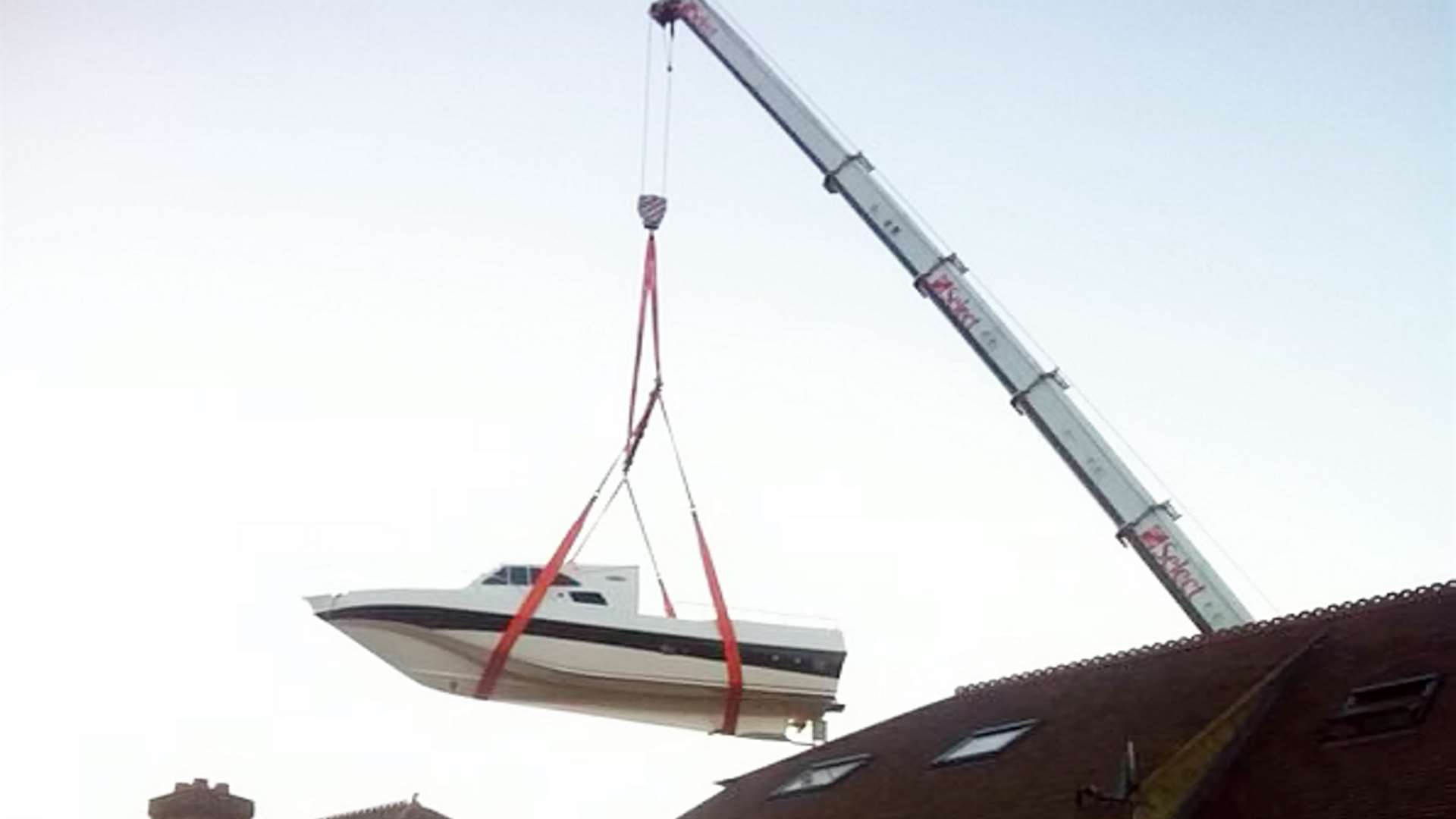 The crane was brought in to get the boat out to sea. Picture: SWNS