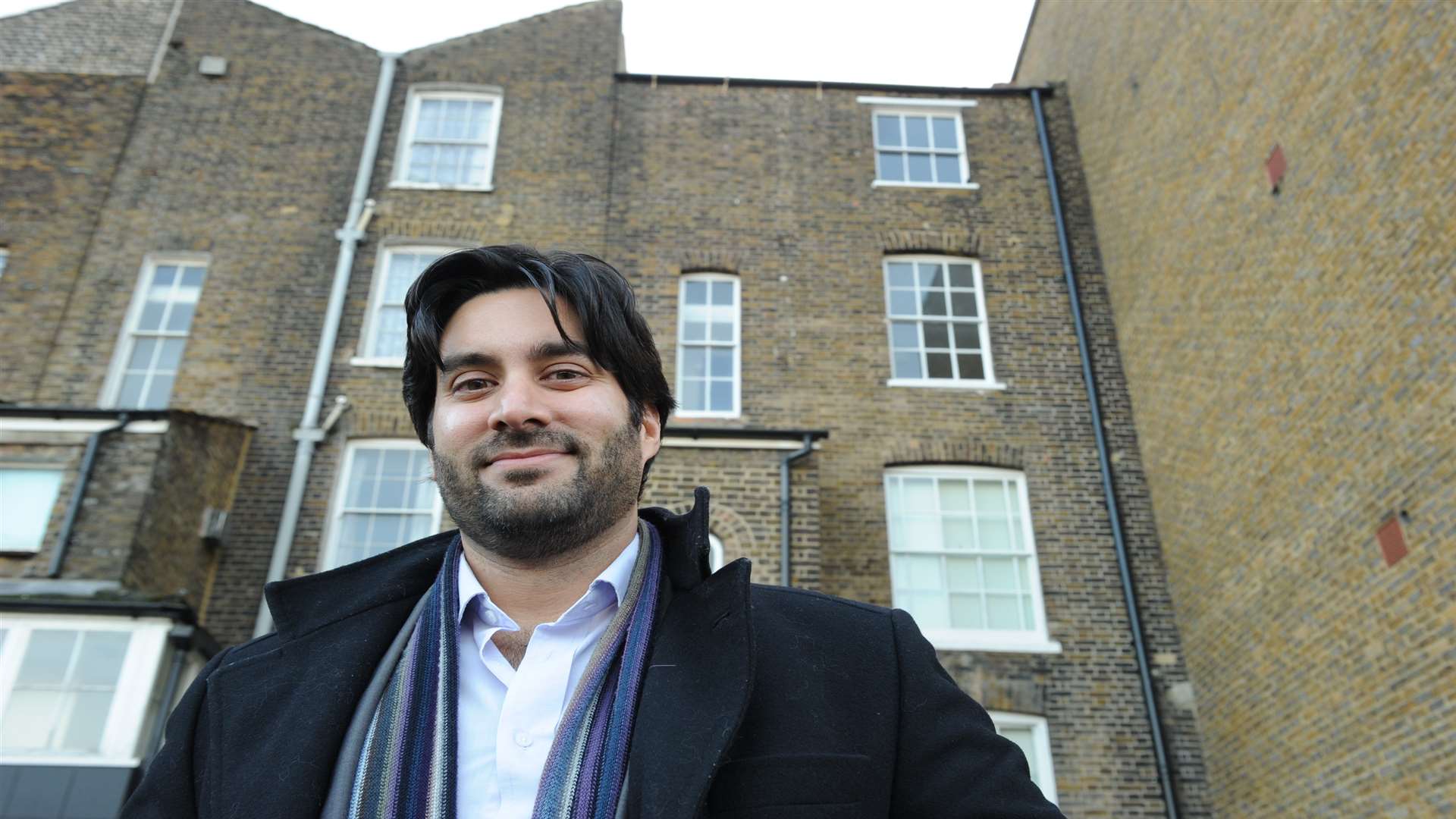 Shahan Lall with one of his properties in New Road, Chatham