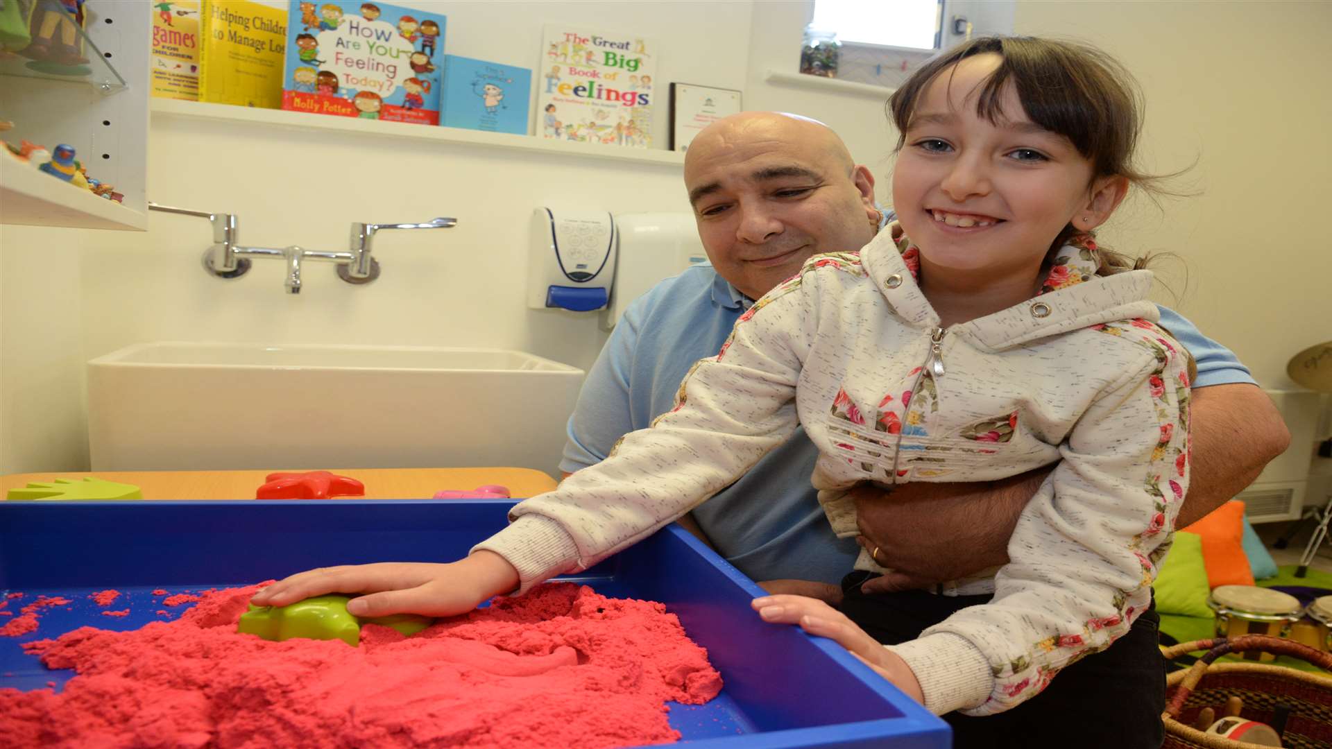 Peter Meli and daughter Lucie, eight in the new play area at the Ellenor Hospice in Coldharbour Road, Gravesend