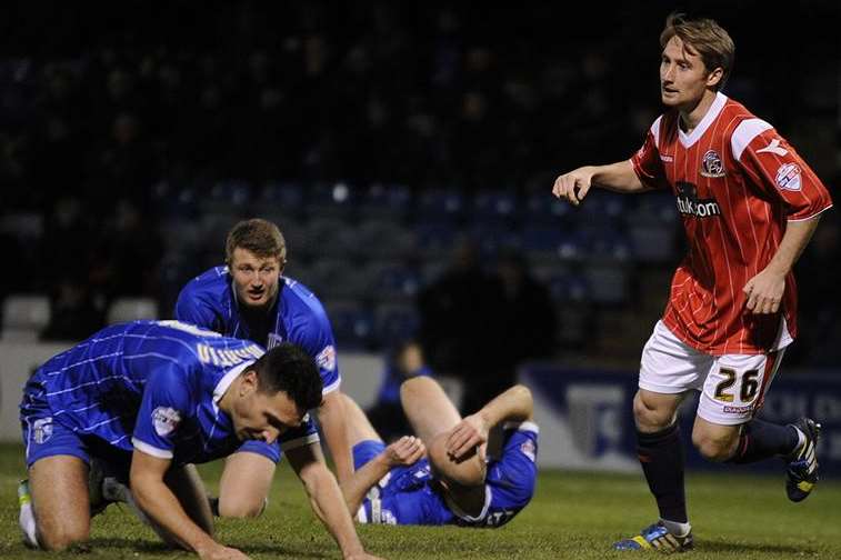 Gillingham's defence is in disarray after Romaine Sawyers equalises for Walsall. Picture: Barry Goodwin