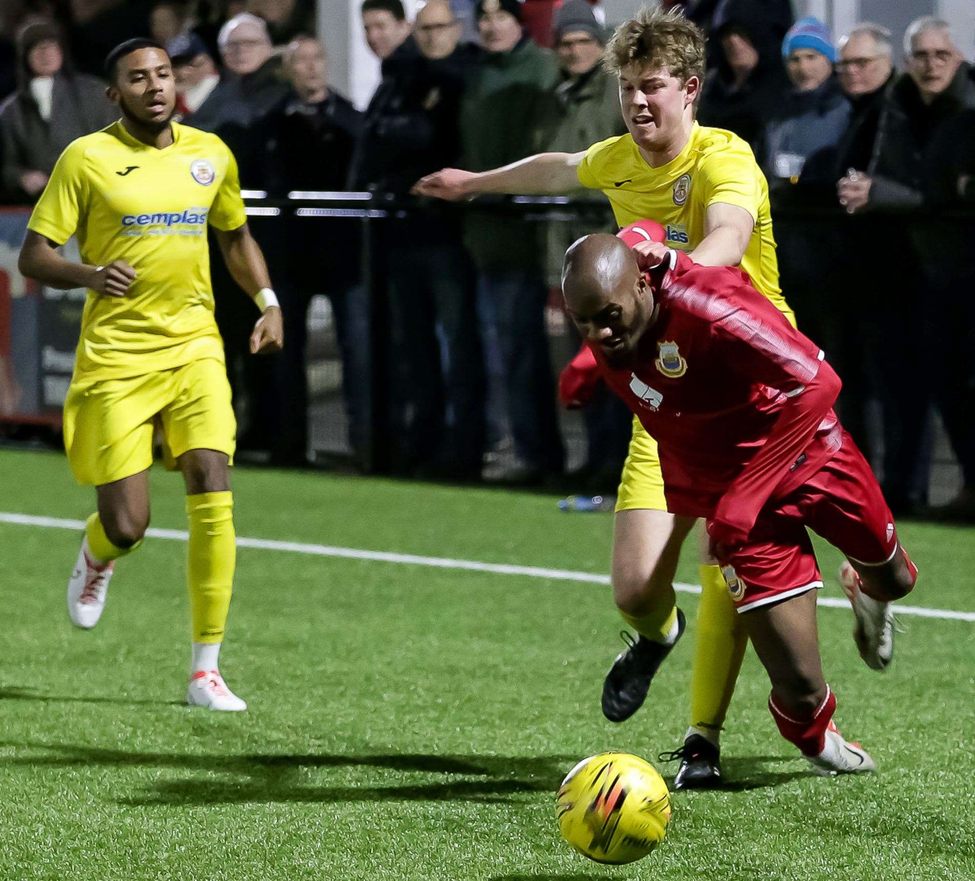 Whitstable home debutant Malachi Hudson is brought down during their 2-1 Kent Senior Trophy Semi-Final loss to Croydon on Tuesday night. Picture: Les Biggs
