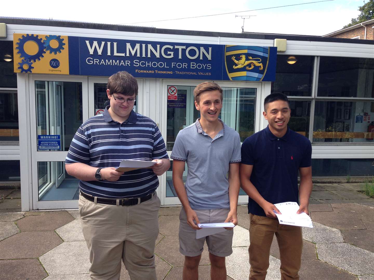 Wilmington students Josh Brown, James Bevis and Gilbert Sagalla
