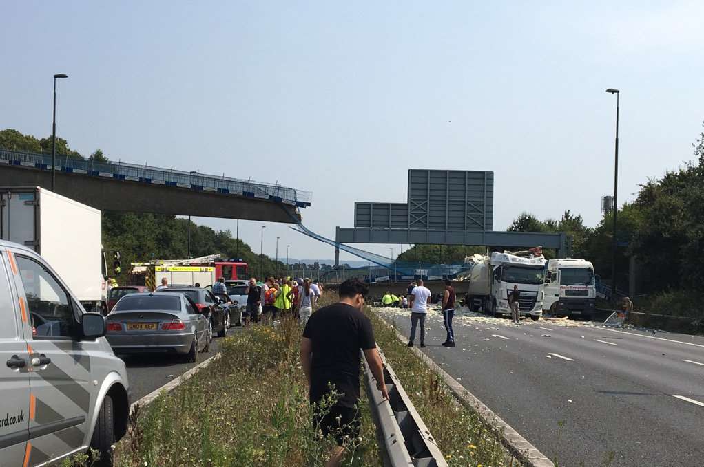 The M20 closed after a pedestrian bridge collapsed onto the carriageway. Picture: Natasha Najm