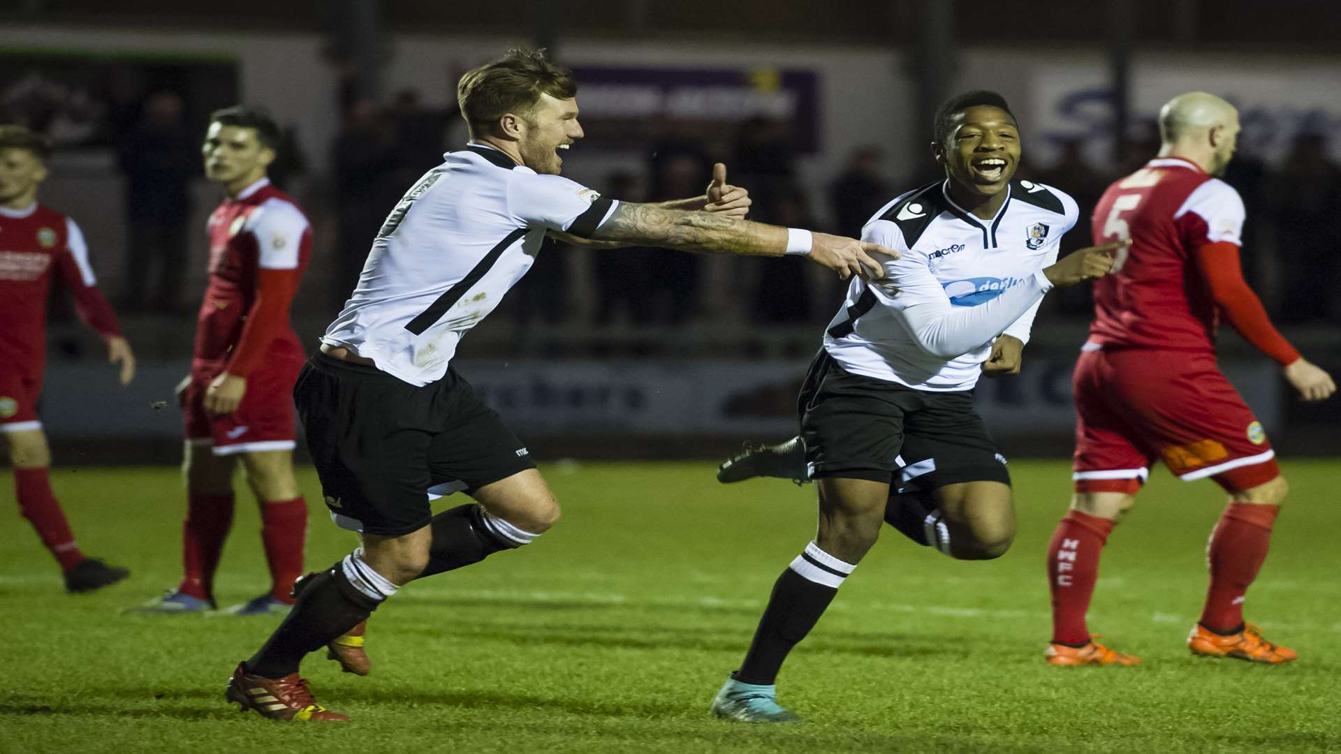 Ebou Adams celebrates with captain Elliot Bradbrook after scoring to make it 4-2 Picture: Andy Payton