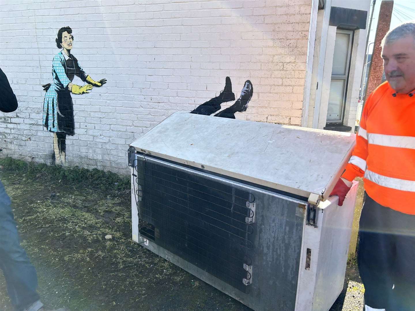 Thanet District Council removing the chest freezer from the Banksy artwork in Margate. Picture: Dan Bambridge-Higgins