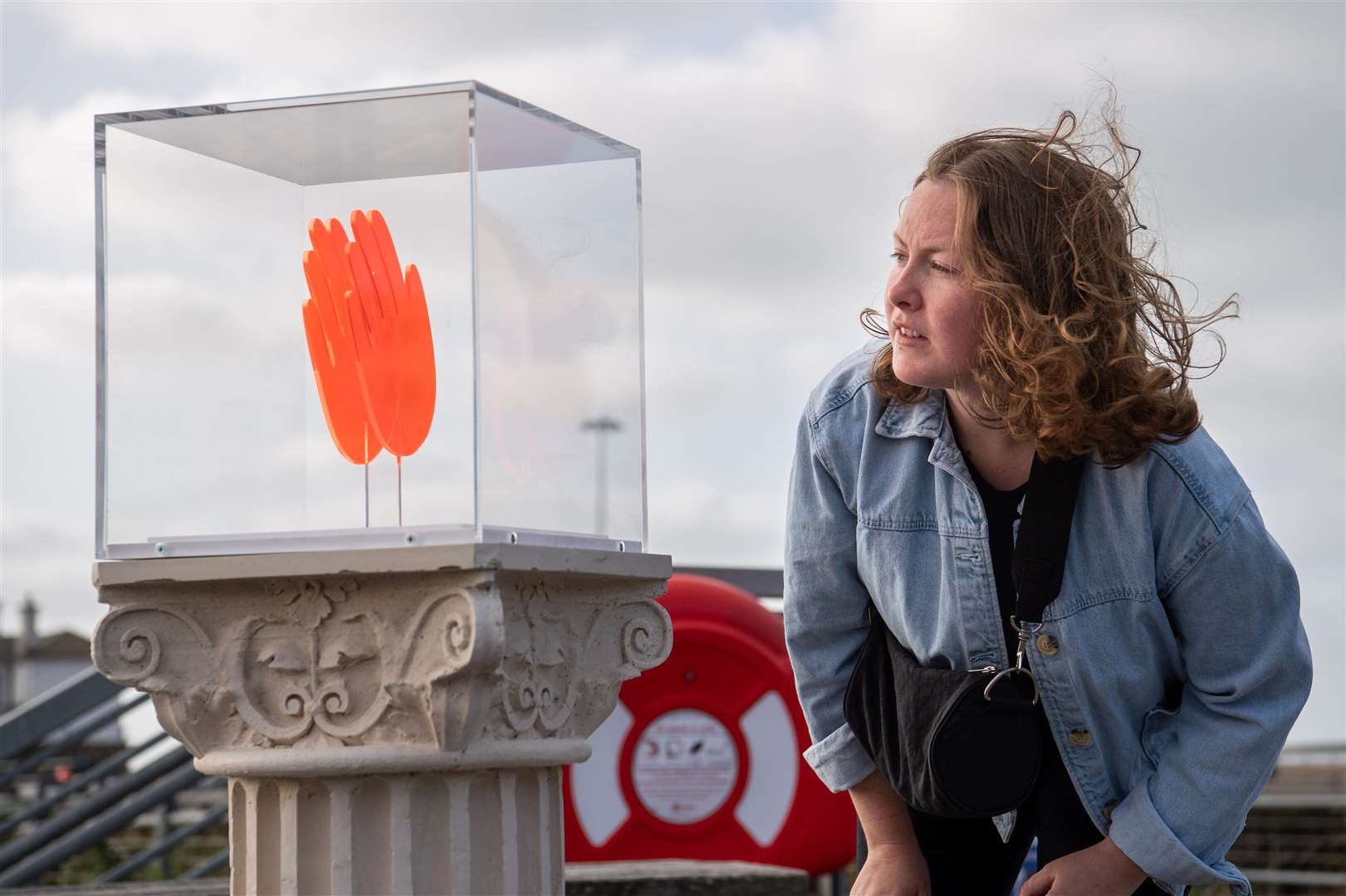 A passer-by looks at a work by Maureen Jordan on Folkestone sea front as part of Creative Folkestone's The Plinth Picture: Matt Crossick/PA Wire