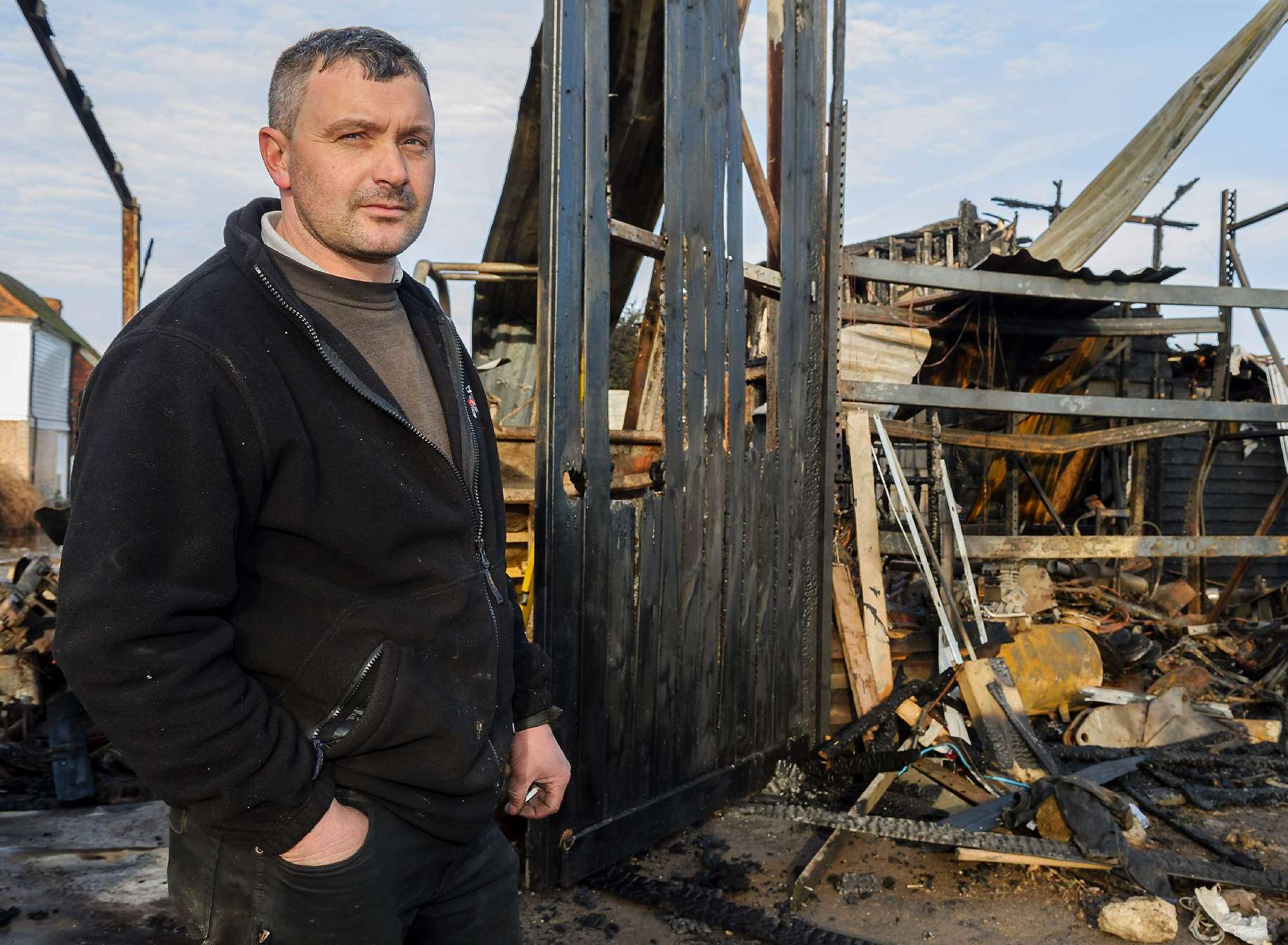 Phil Tassell battled to get his family out as his home went up in flames. Picture: Andy Payton