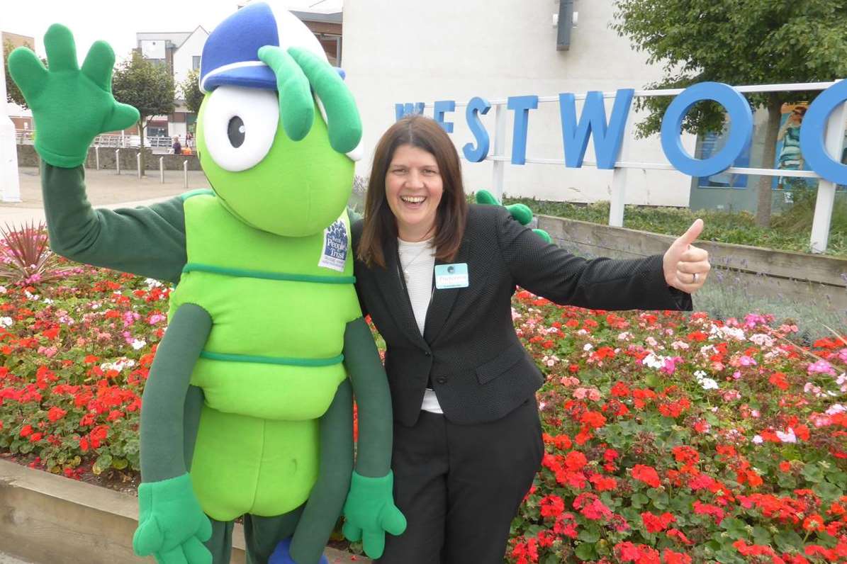 New Westwood Cross centre manager Francesca Donovan with KM Walk to School mascot Buster Bug to announce Land Securities support for the KM Charity Team's walk to school and literacy schemes