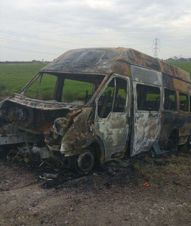 Police find stolen bus in flames in marshland in Lower Higham Road, Gravesend