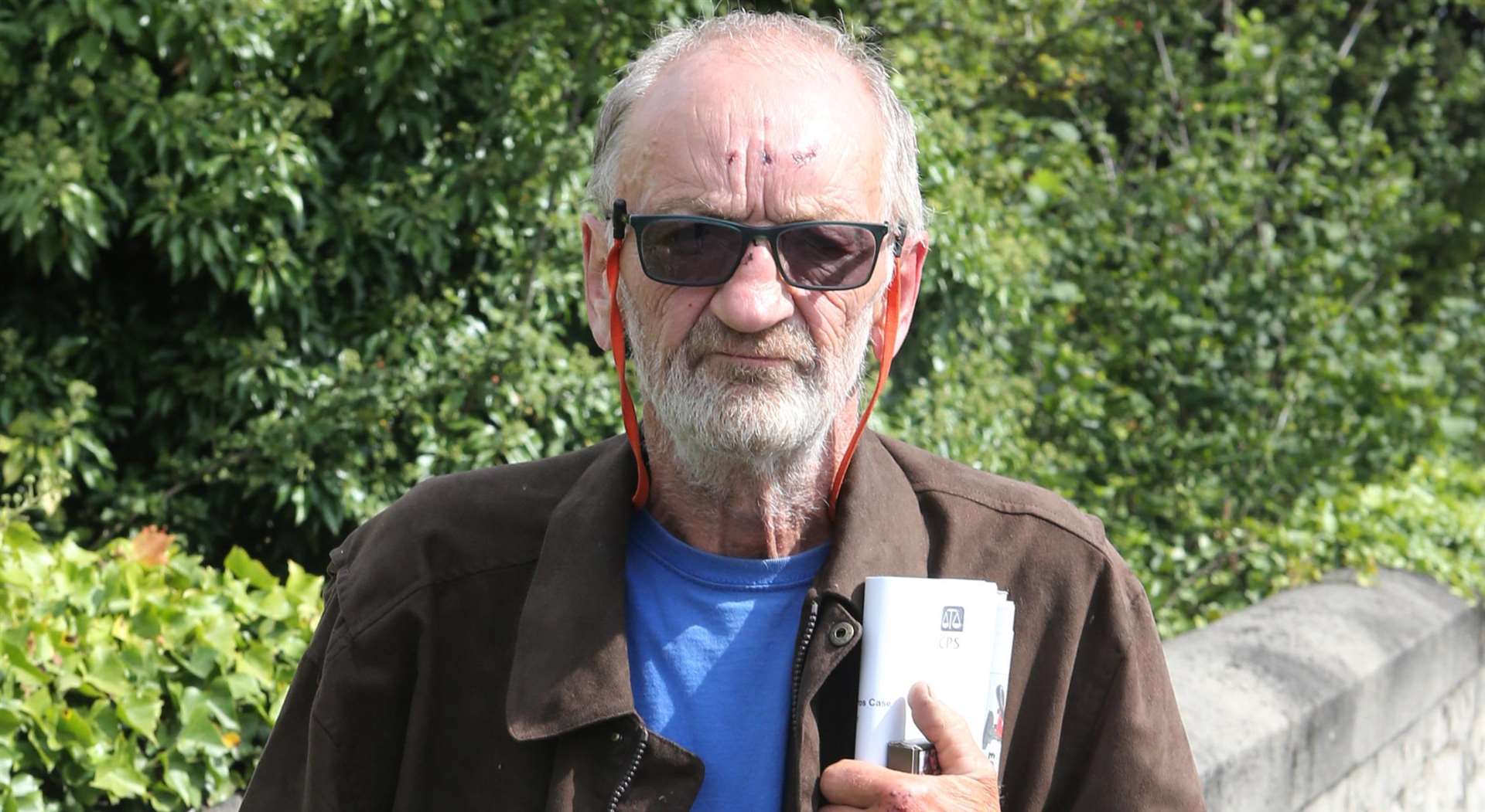 John Mcenery, 73, former BAFTA nominated who is accused of having a black water pistol and pretending it was a gun, pictured after his court appearance at Maidstone Magistrates. Picture by: John Westhrop