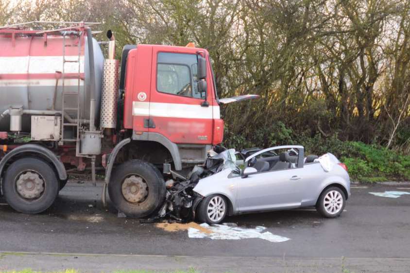 This shocking image shows Simon's car underneath the lorry. Image: Kent Police.