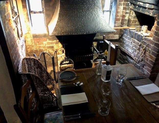 All set for dinner – would you like a table near the fire?