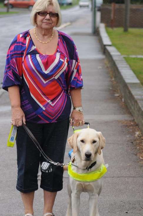 Patricia out for a walk with Zebedee