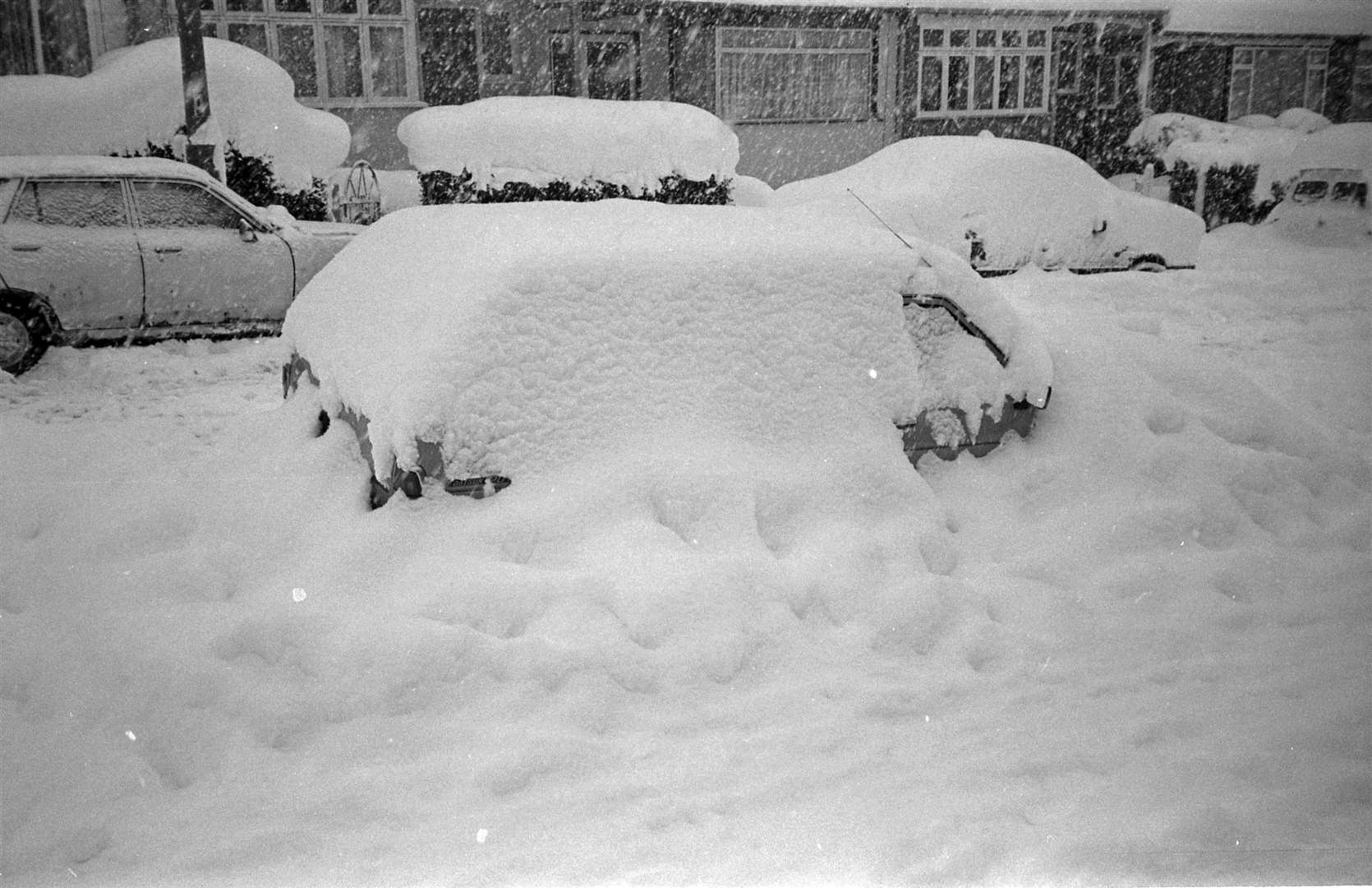 There's a car under there somewhere