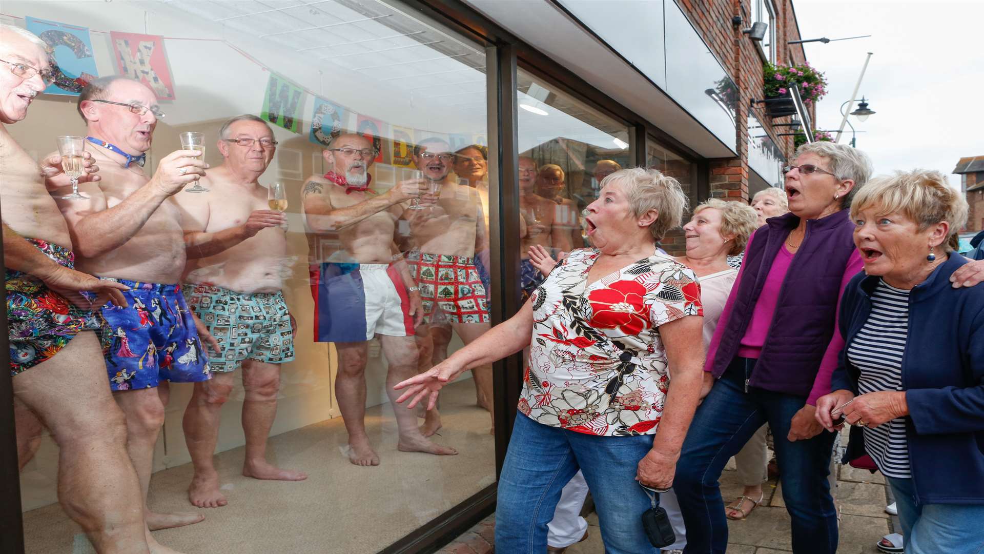 University of the Third Age men get nearly naked in Barsley's window for Prostate Cancer. Picture: Matthew Walker