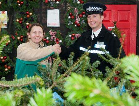 Pictured is Inspector Justin Watts of Kent Police and Anne O'Hare, Manager of Notcutts.