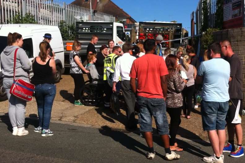 Friends gather outside Adams Gas to honour tragic Jarrad Swan