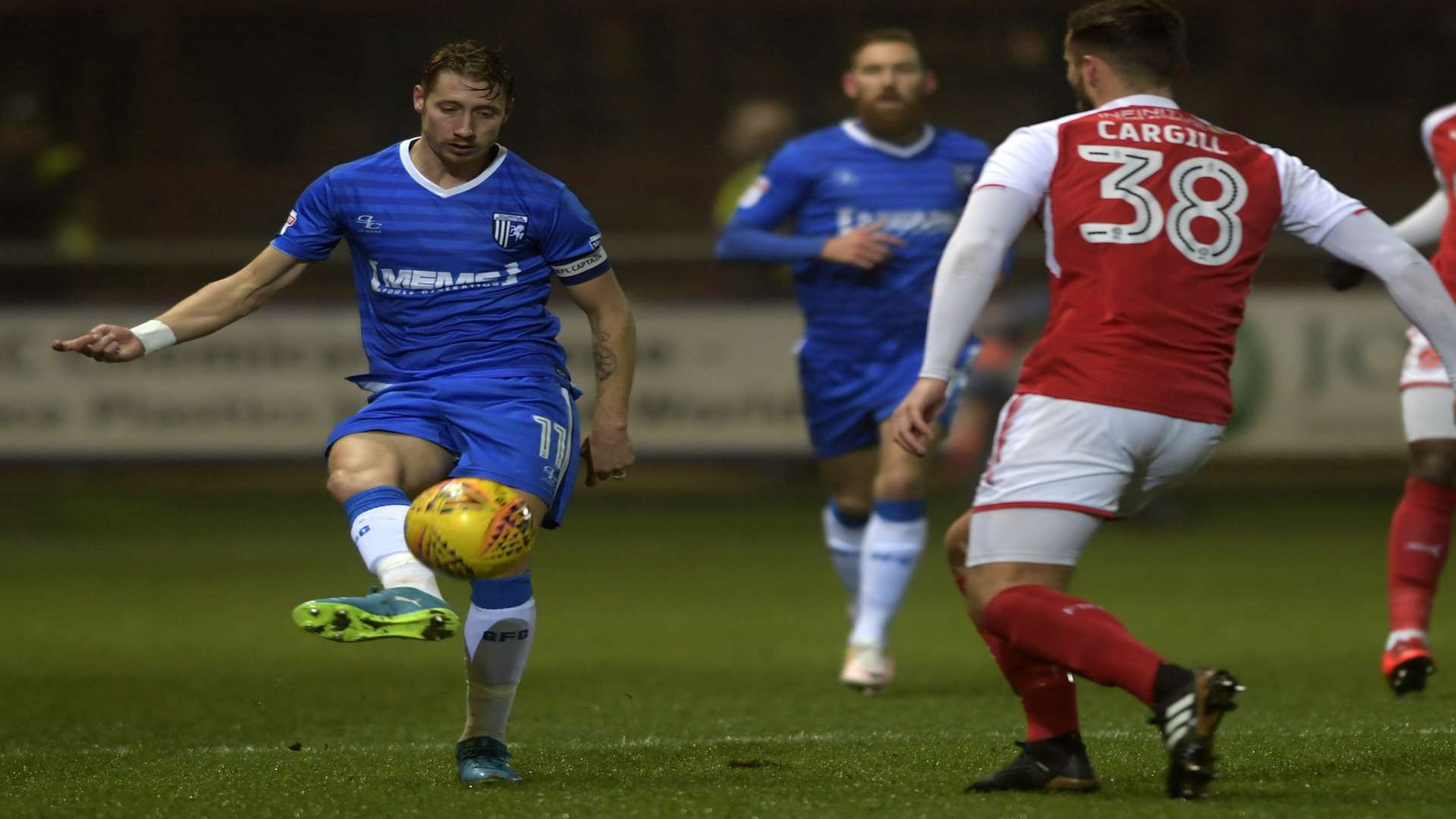Lee Martin up against former Gills man Baily Cargill Picture: Barry Goodwin
