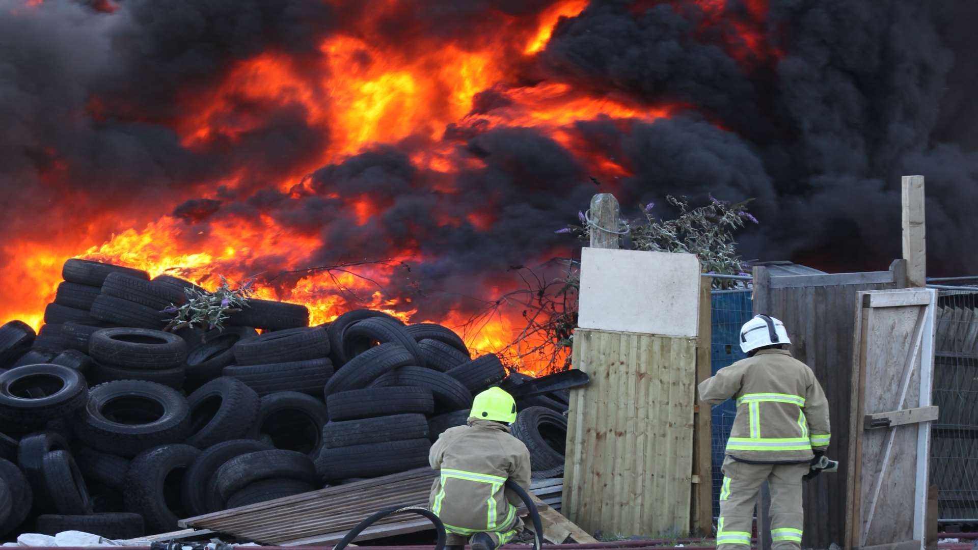 Firefighters tackling large tyre fire in Gravesend. Picture: Phil Tobin