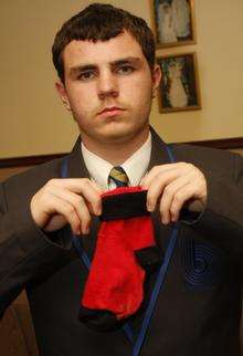 Luke Smith, sent home from Brompton Academy for wearing the wrongs socks.