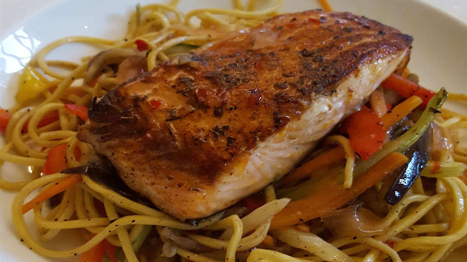 Catch of the day - salmon with noodles, vegetables and chilli sauce