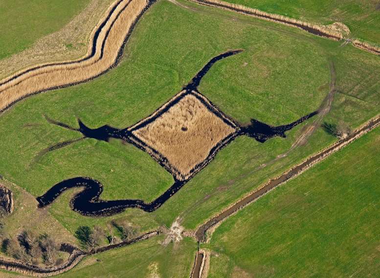 The decoy pond on the marshes at High Halstow illustrates one way people have exploited the Hoo Peninsula's natural resources. Decoy ponds were introduced from the Netherlands in the 17th century. Picture: Historic England