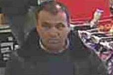 Police are looking for a man after a woman has £100 taken from her bank account