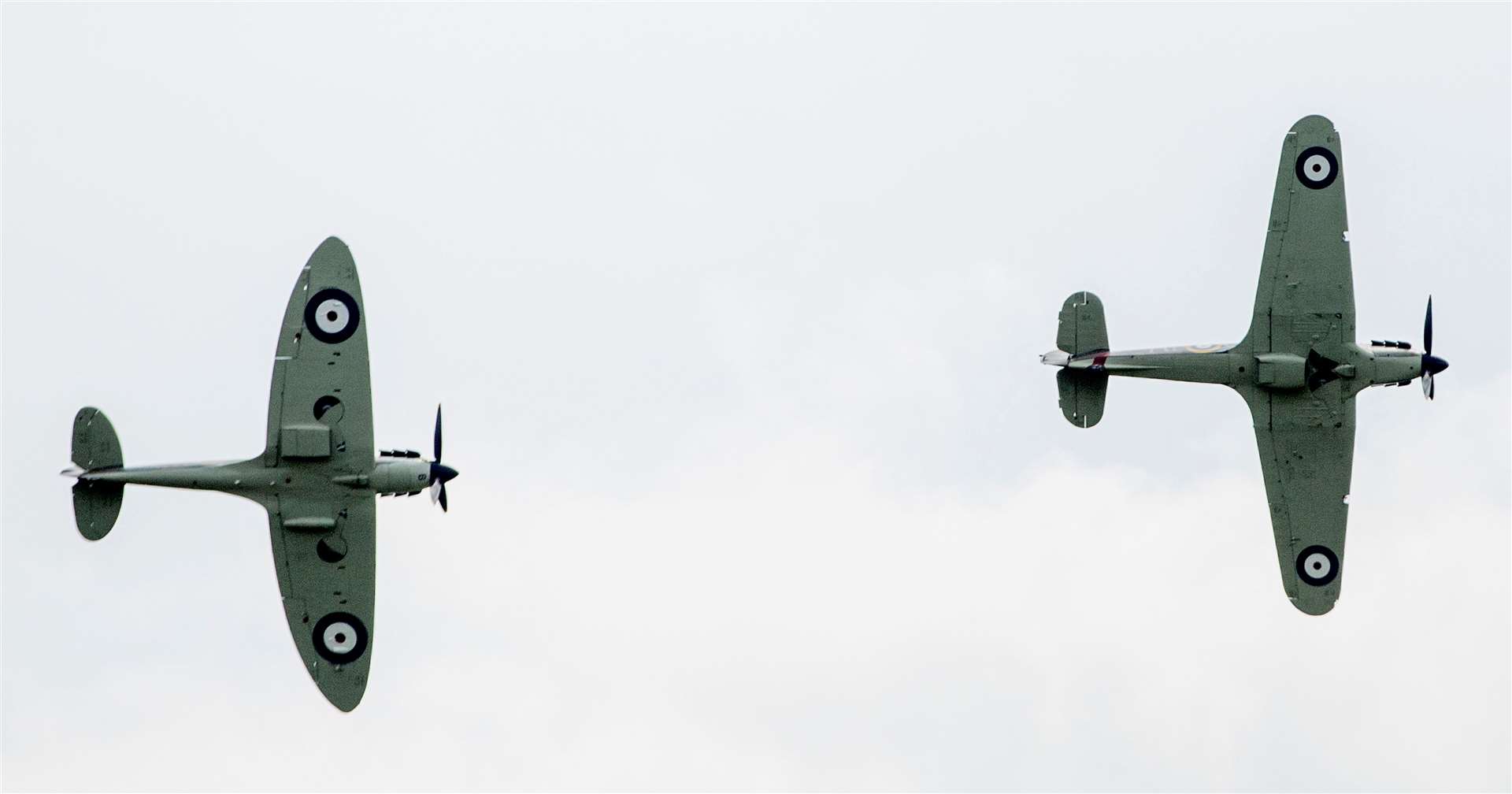 A Hurricane and Spitfire in action at an airshow. Photo: Mark Williamson