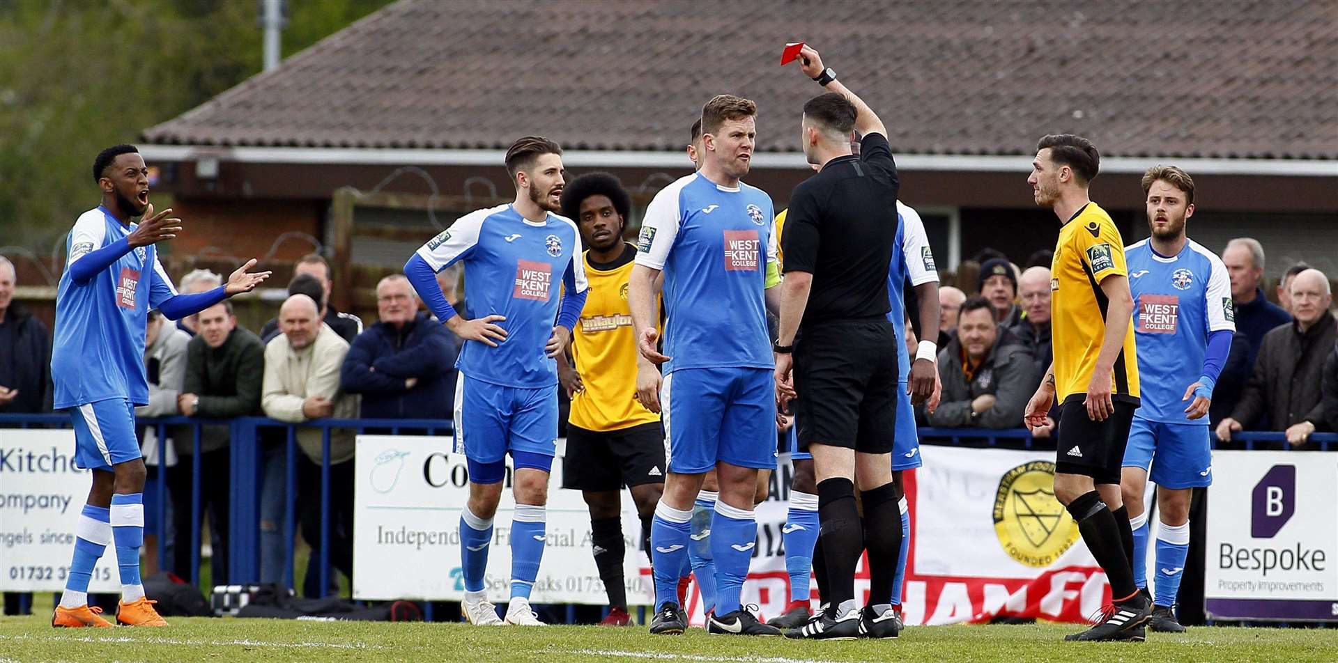 Referee Michael Ryan shows Tonbridge captain Sonny Miles a red card Picture: Sean Aidan