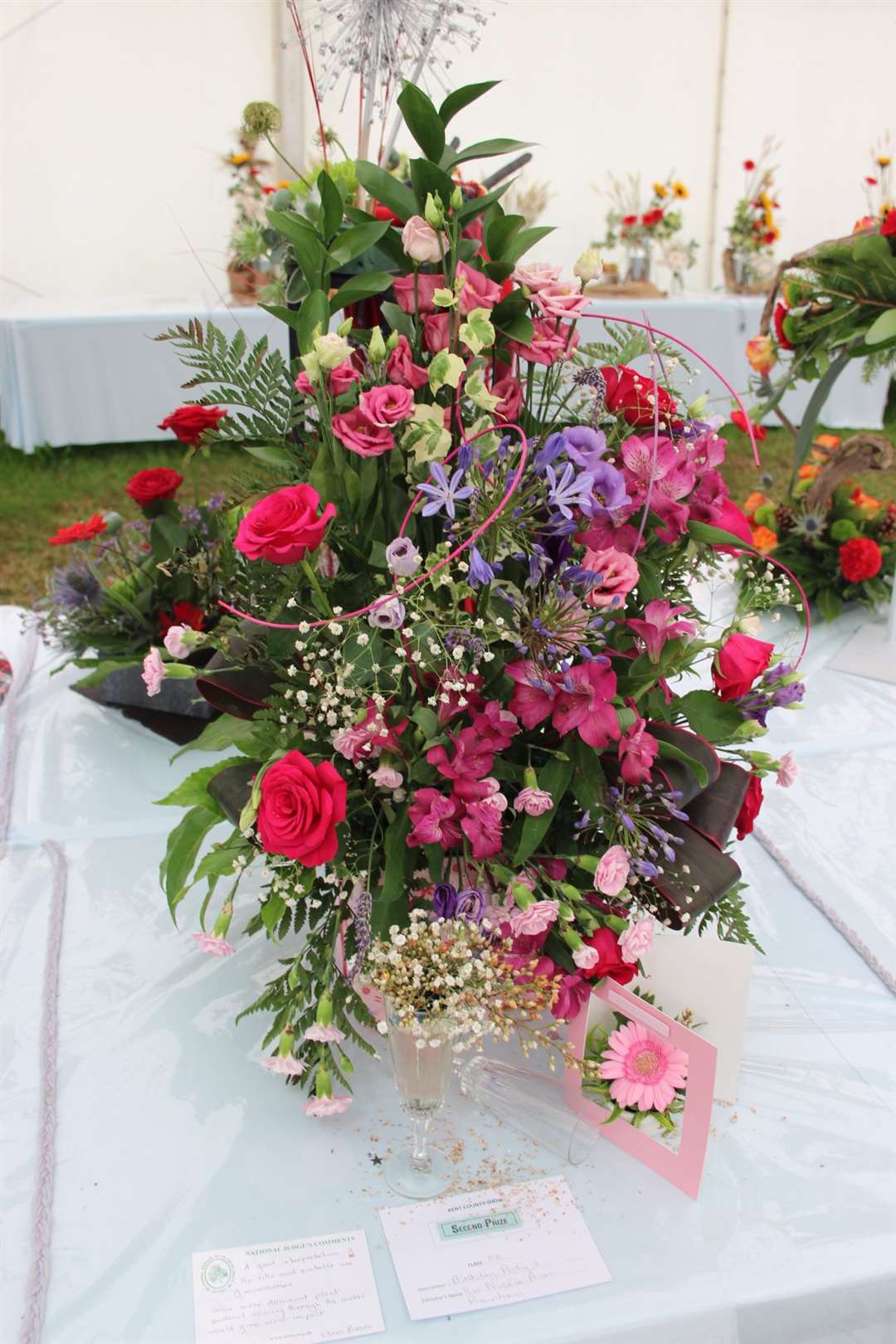 Nicola Prior, who runs Nic's Restaurant in Queenborough, came second in the Kent County Show flower competition 'Birthday Party' category. Judge Chris Brown said it was a "good interpretation of the title and suitable use of accessories." (13545735)