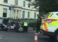 A motorcyclist was taken to hospital after the crash