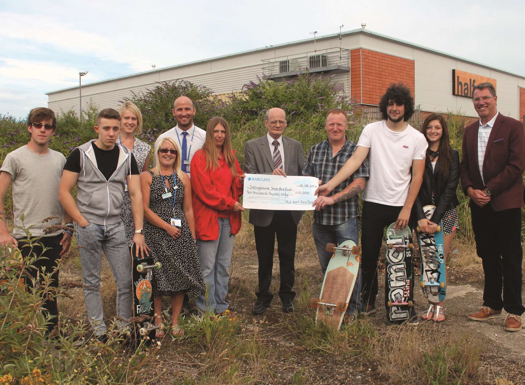 The skate park will be built where these campaigners are standing, behind Halfords at Sittingbourne Retail Park
