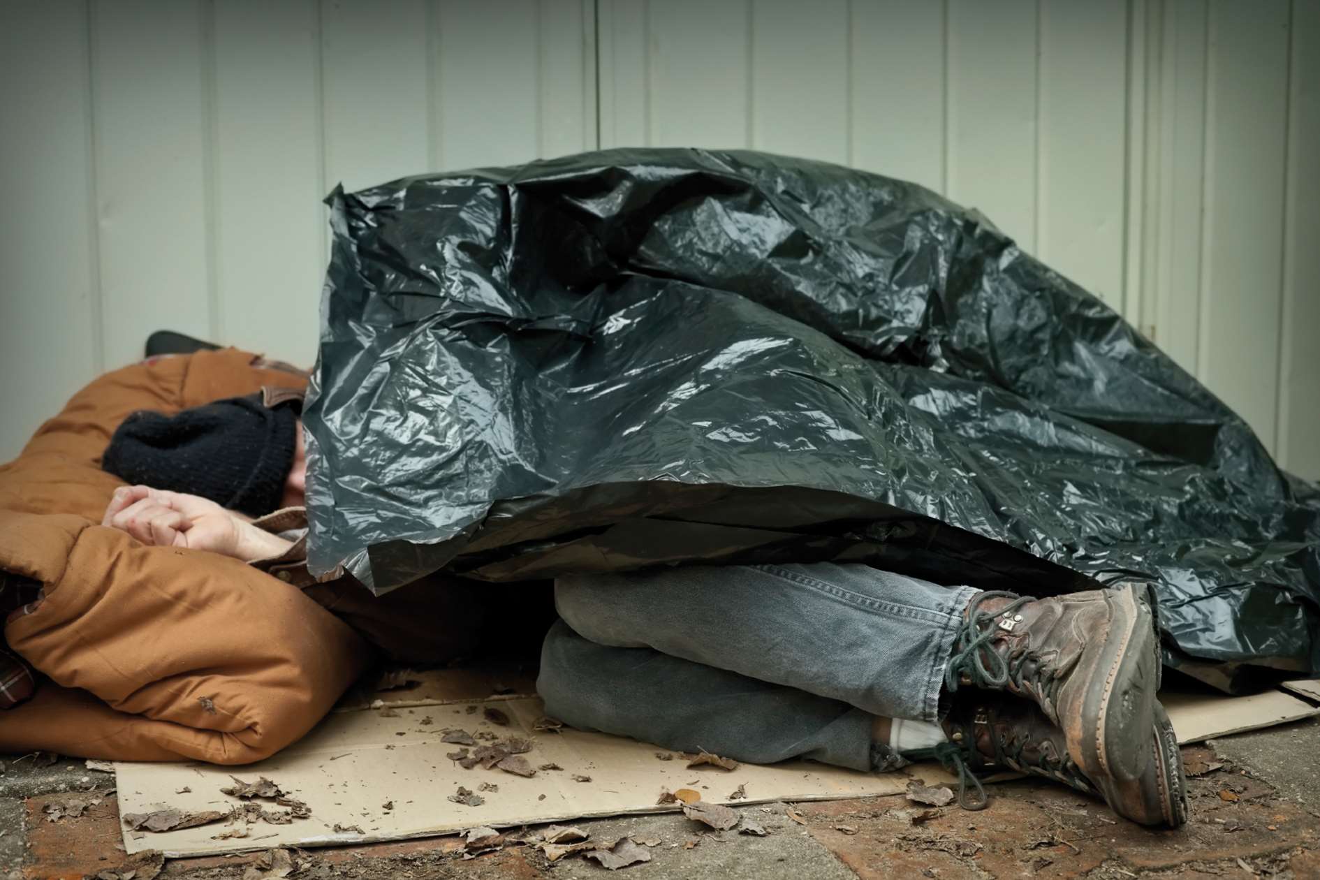 Homeless person living on street. Stock pic.